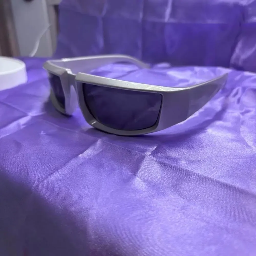 Silver unisex wraparound sunglasses with dark tinted lenses futuristic cybercore